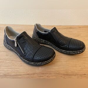 Rieker Black Perforated Flats with Zipper